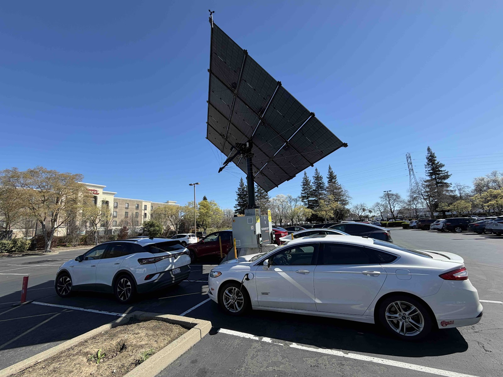 Solar-powered EV charging installation at a commercial property managed by Clear Blue Commercial